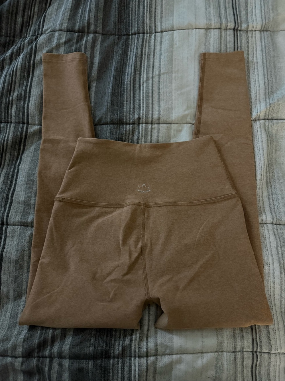 Beyond Yoga High-Waist Leggings in a tan